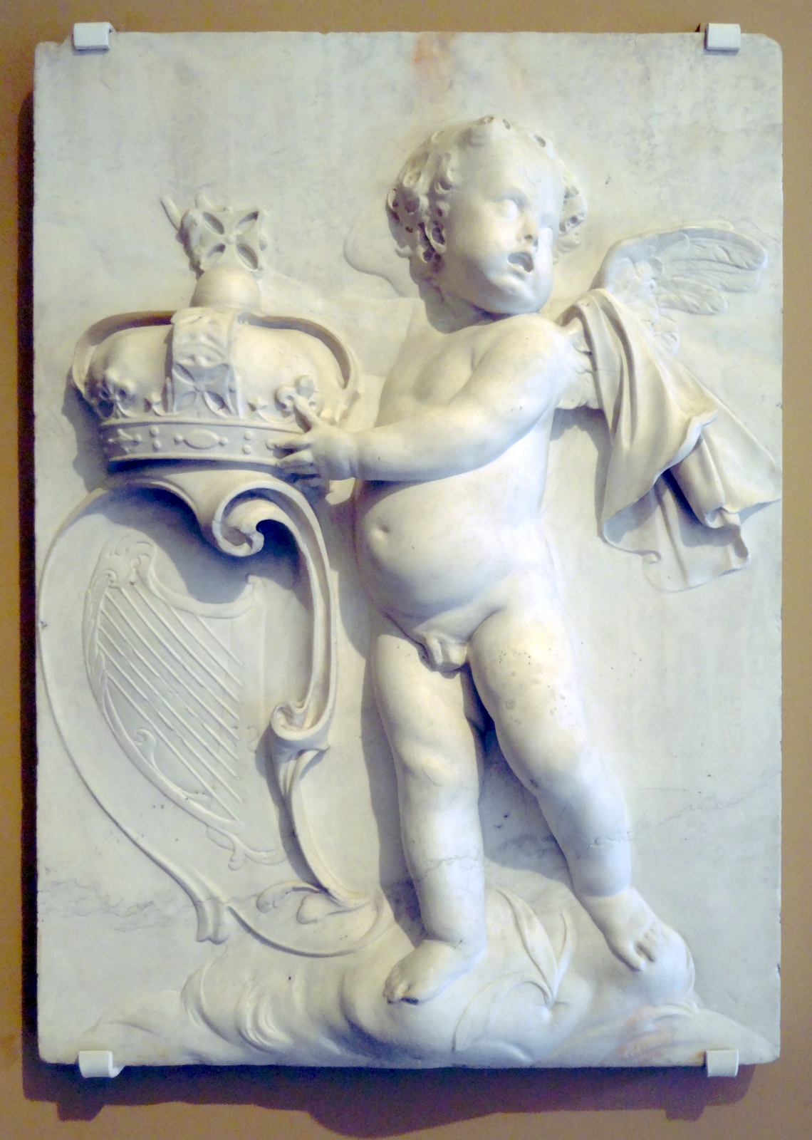 photo of a putto in stone relief