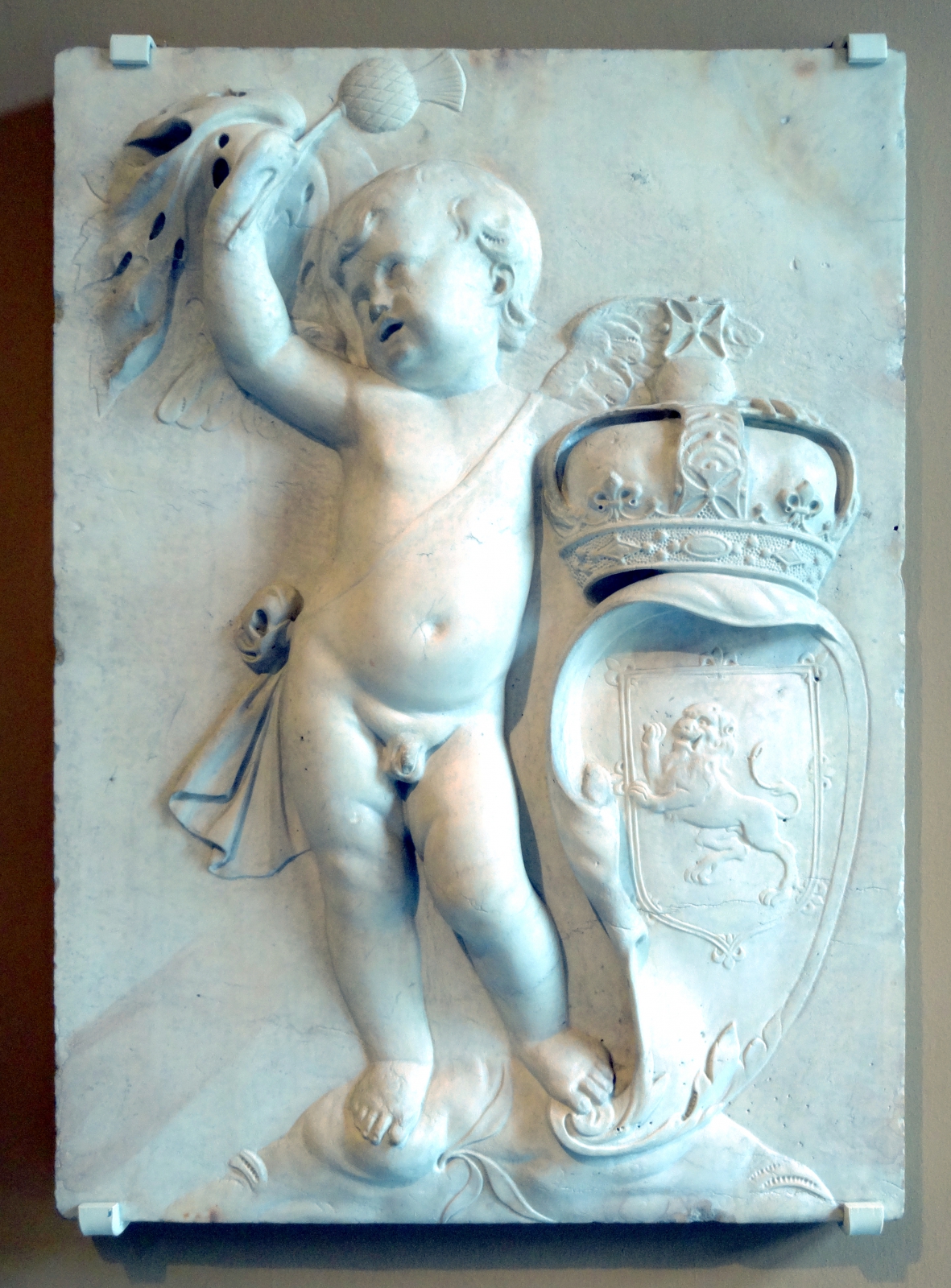 photo of a putto in stone relief