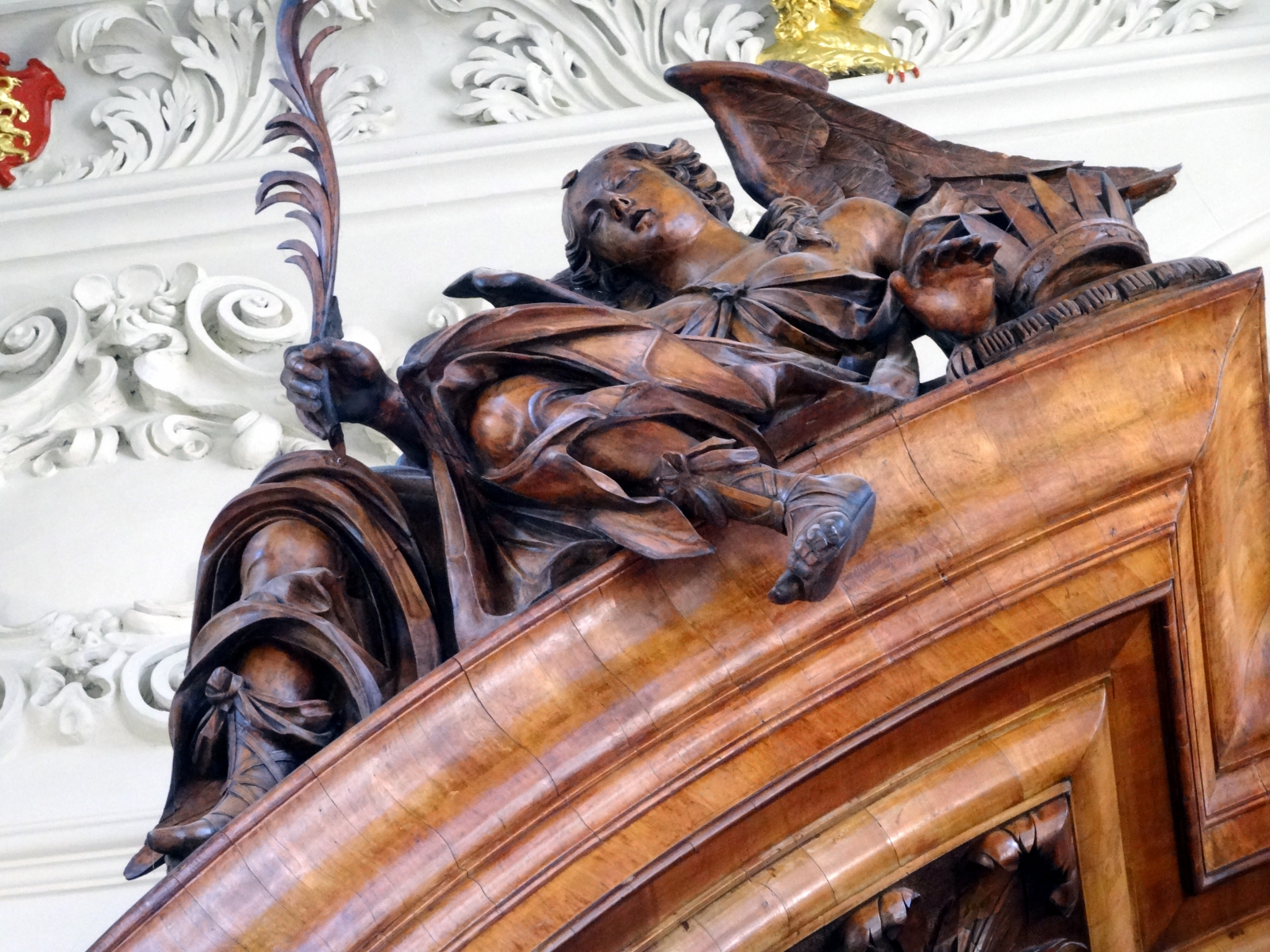 photo of figure atop the reredos - north
