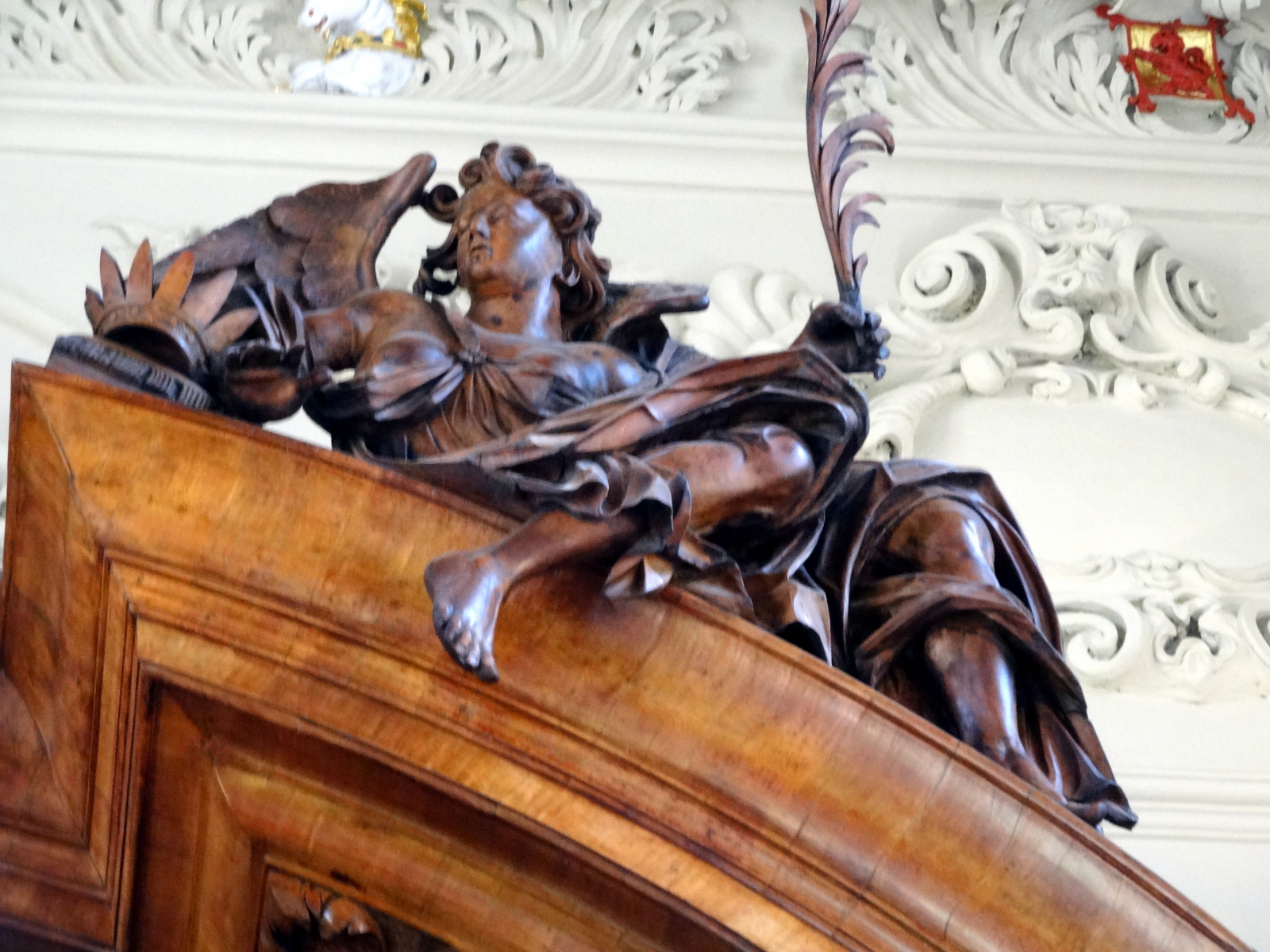 photo of figure atop the reredos - south